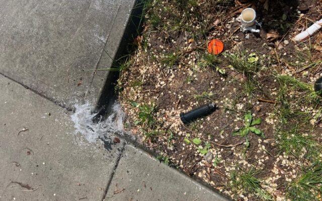 Broken Sprinkler head with water gushing from underground broken sprinkler